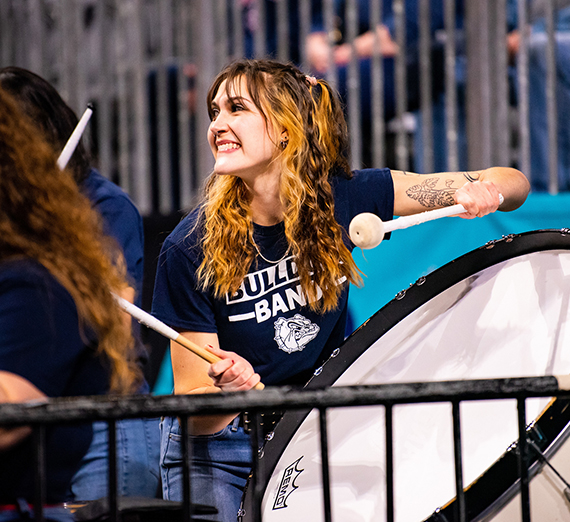 Female student plays drums