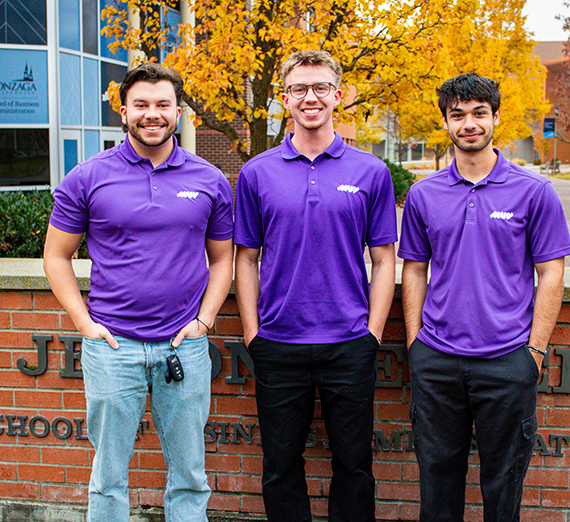 Gonzaga Senior Maalik Brown, Computer Science major, sitting at a table.