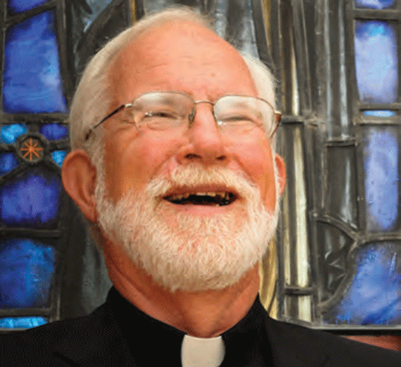 father kuder smiling